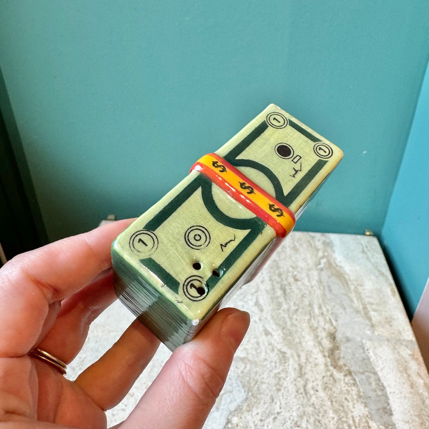 Vintage Ceramic Stack of Money Salt Shaker