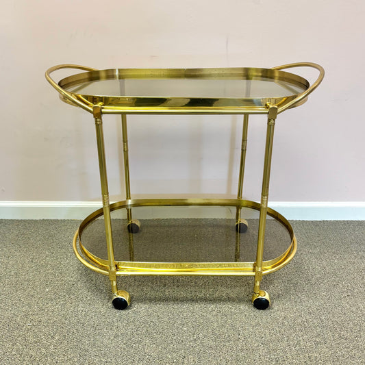 Vintage Oval Brass and Smoked Glass Rolling Bar Cart