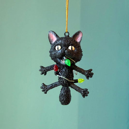 Shocked Black Cat Wrapped in Lights Ornament