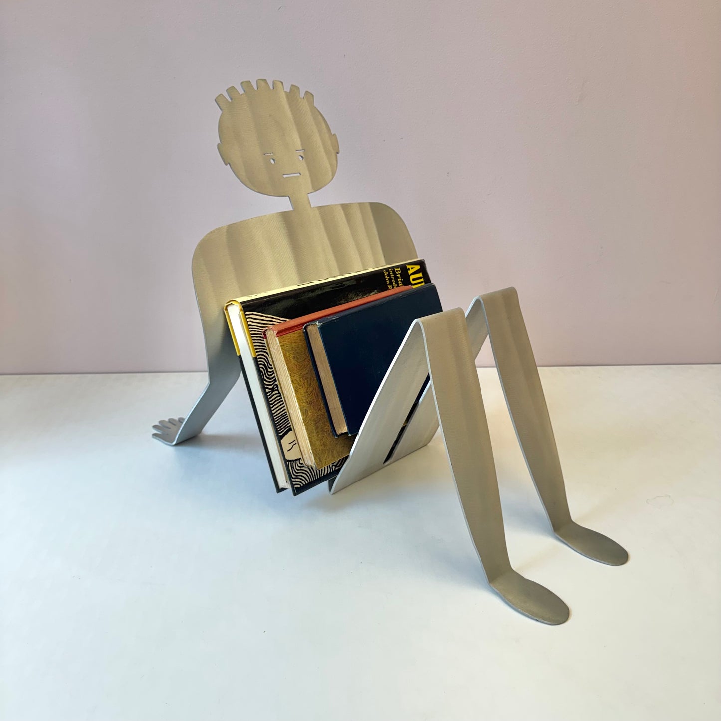 Vintage Postmodern Aluminum Man Magazine Rack by Fred Garbotz