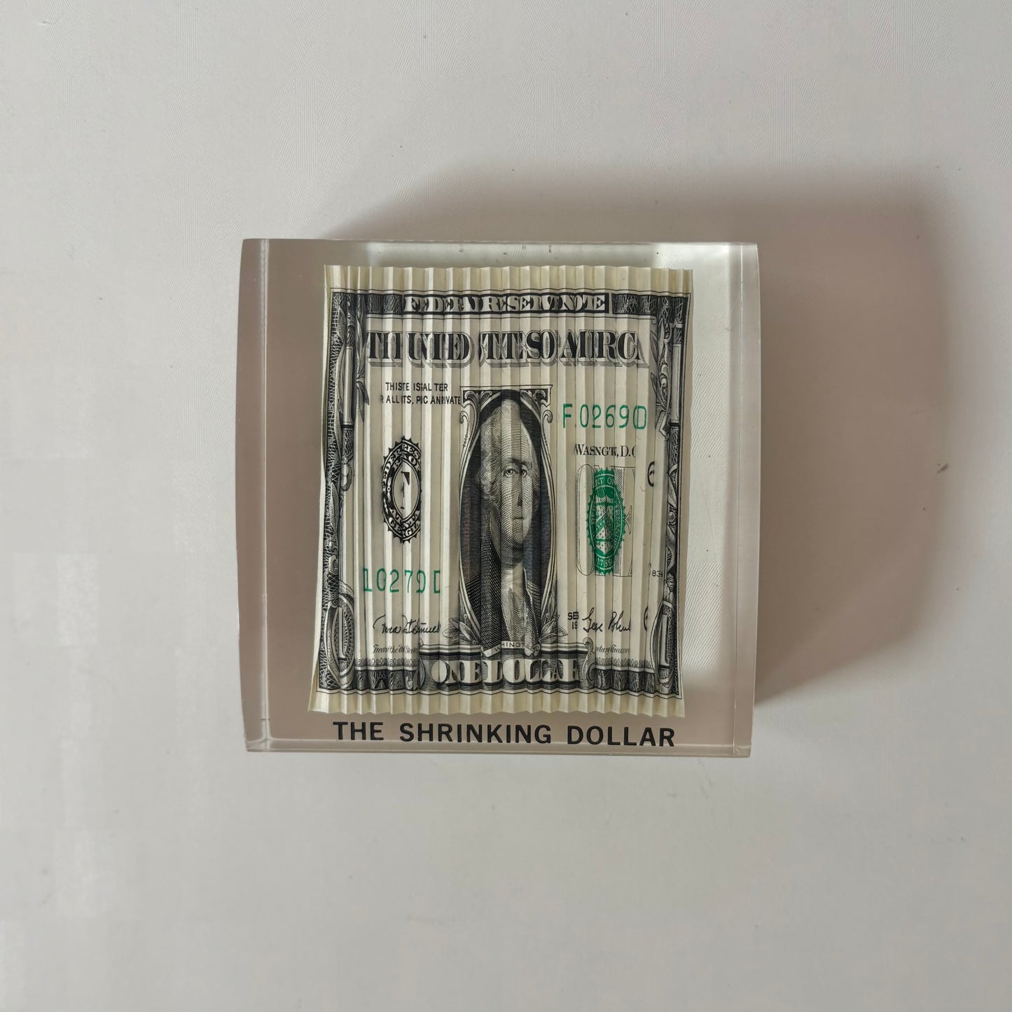 Vintage Lucite Encased "Shrinking Dollar" Paperweight