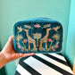 Rich Blue Wild Giraffe Palm Makeup Bag by Elizabeth Scarlett