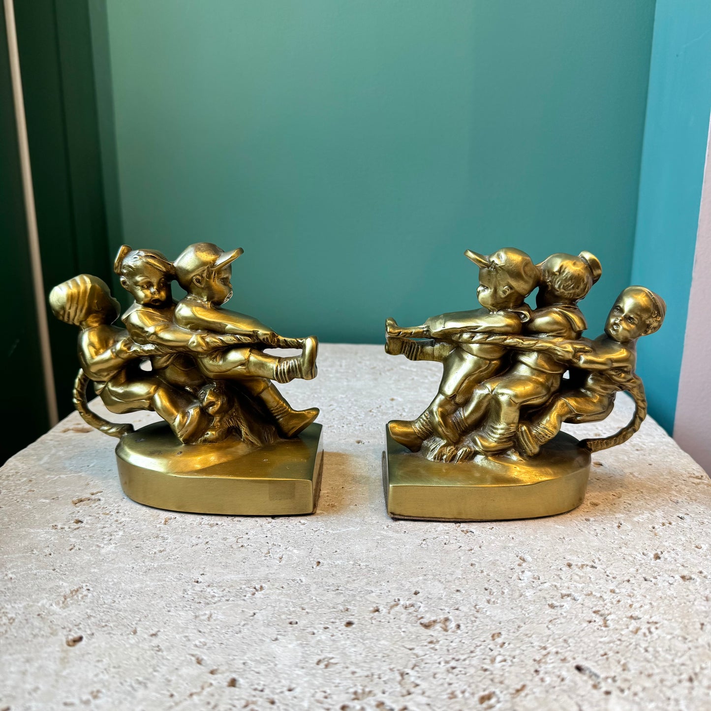 Pair of Vintage Mid Century Brass “Tug of War” Bookends