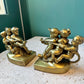 Pair of Vintage Mid Century Brass “Tug of War” Bookends