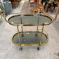 Vintage Oval Brass and Smoked Glass Rolling Bar Cart