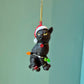 Black Cat with Santa Hat Wrapped in Lights