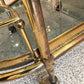 Vintage Oval Brass and Smoked Glass Rolling Bar Cart
