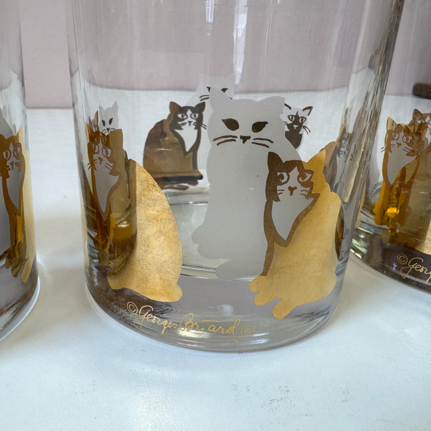 Vintage Set of Four 22 Karat Gold and White Cat Rock Glasses by Georges Briard