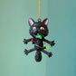 Shocked Black Cat Wrapped in Lights Ornament