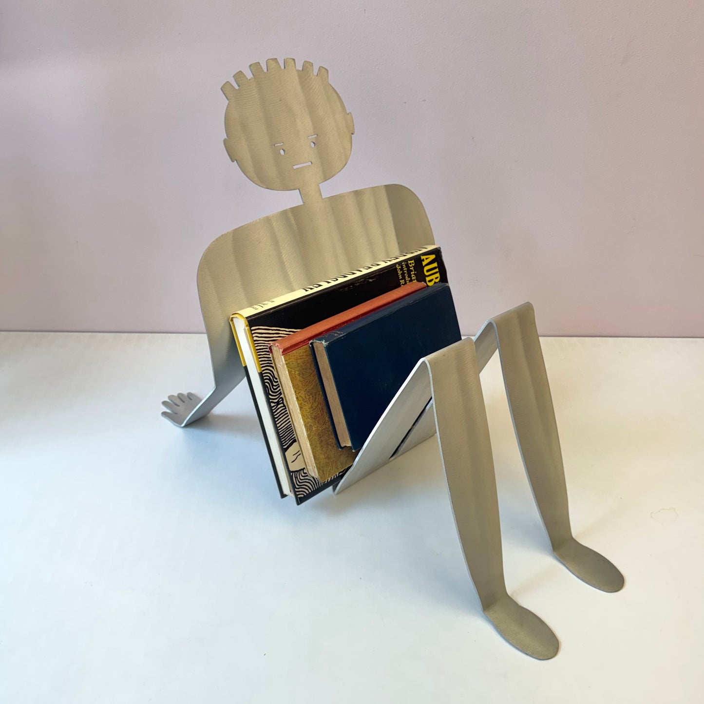 Vintage Postmodern Aluminum Man Magazine Rack by Fred Garbotz
