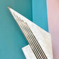 Vintage Tessellated Stone and Brass Inlay Sculpture