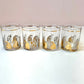 Vintage Set of Four 22 Karat Gold and White Cat Rock Glasses by Georges Briard