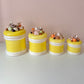 Vintage Set of 4 Seymour Mann Yellow Ceramic Shell Canisters (as is)