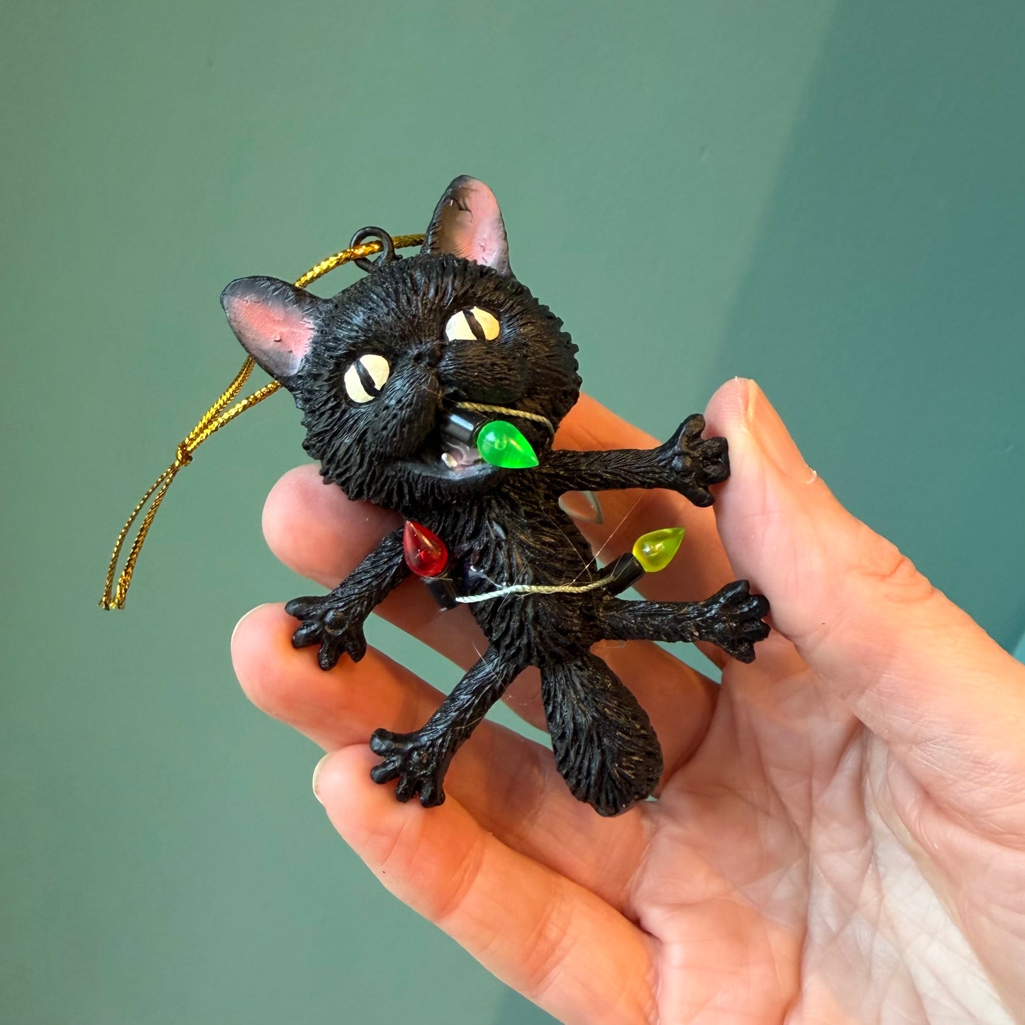 Shocked Black Cat Wrapped in Lights Ornament
