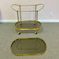 Vintage Oval Brass and Smoked Glass Rolling Bar Cart