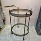 Vintage Mid Century Round Brass and Glass Rolling Bar Cart