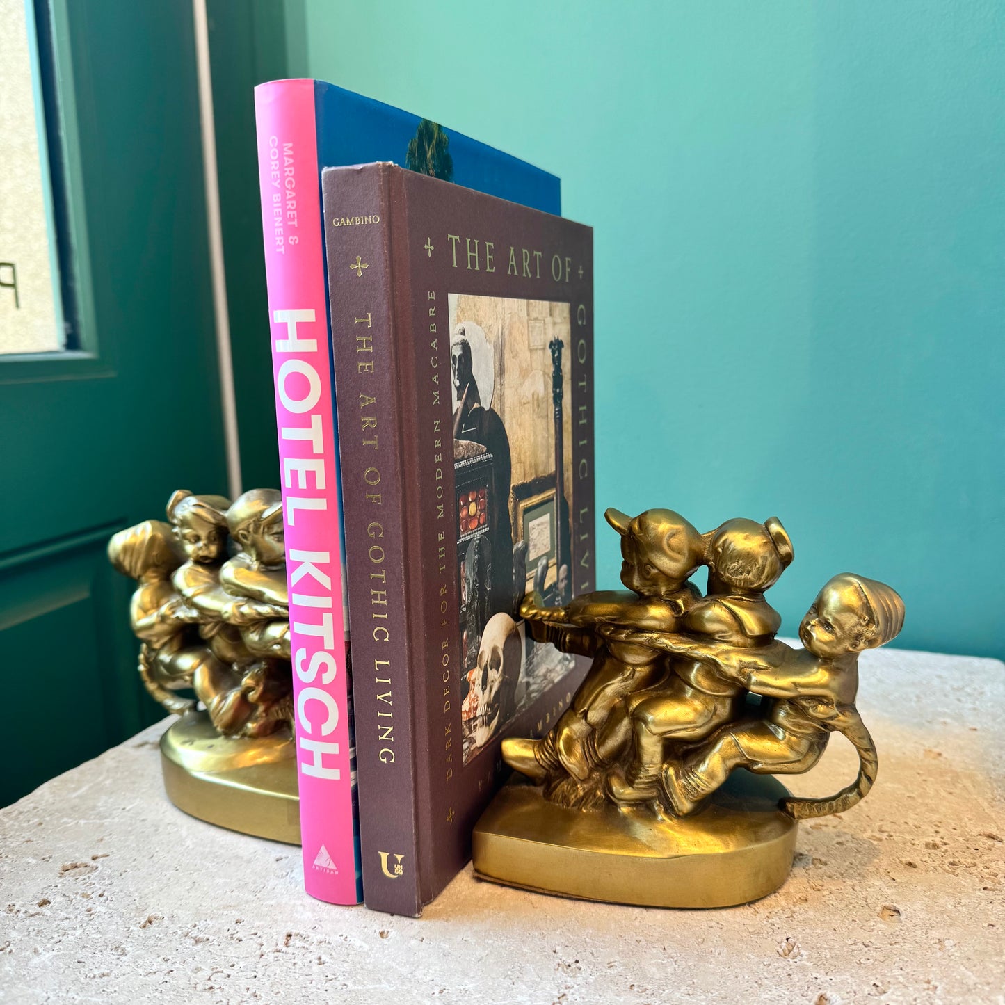 Pair of Vintage Mid Century Brass “Tug of War” Bookends