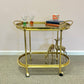 Vintage Oval Brass and Smoked Glass Rolling Bar Cart