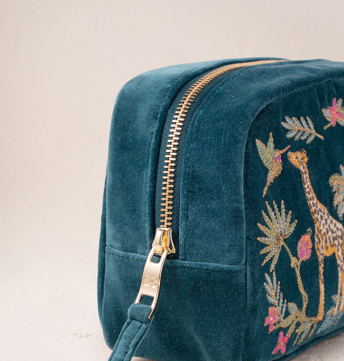 Rich Blue Wild Giraffe Palm Makeup Bag by Elizabeth Scarlett