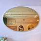 Vintage Amber Tinted Oval Mirror
